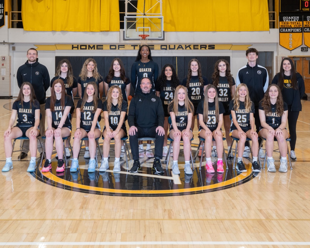 QV Girls Basketball official team photo in the Quaker Valley gym